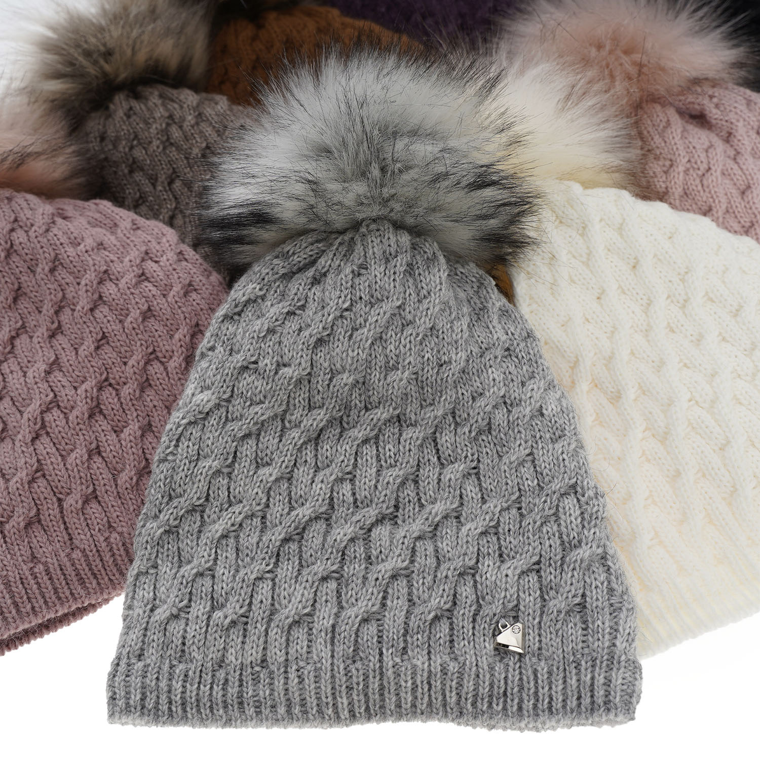 Căciulă de iarnă pentru femei roz cu pompon Kaskada