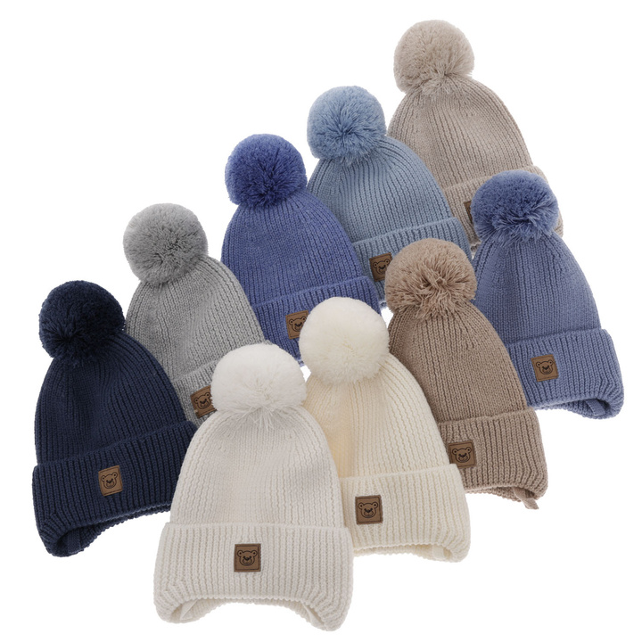 Căciulă de iarnă albastru marin pentru băieți din 100% lână merino extra fină, căptușită cu polar din lână Tofik