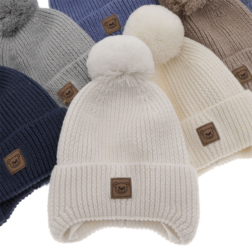 Căciulă de iarnă ecru pentru băieți din 100% lână merino extra fină, căptușită cu polar din lână Tofik