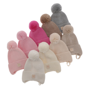 Căciulă de iarnă ecru pentru fete din 100% lână merino extra fină, căptușită cu polar din lână Hakkari